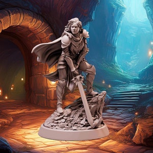 May include: A detailed miniature figurine of a female warrior, clad in armor and holding a sword, stands atop a rocky base. The figure is set against a backdrop of a cavern with an arched entrance and a glowing blue passage.