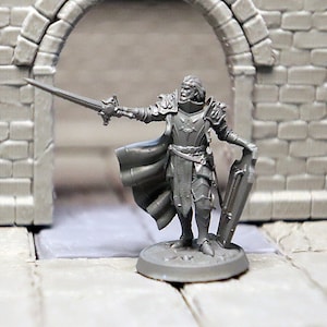 May include: A gray miniature figure of a knight in armor, holding a sword and shield. The knight stands in front of a stone archway. The figure is on a round base.