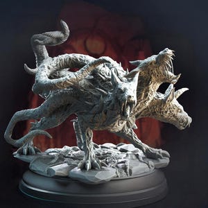 May include: A detailed sculpture of a three-headed wolf-like creature with sharp teeth and claws. The sculpture is gray and sits on a rocky base, with a dark background. The creature has a menacing appearance, with open mouths and a twisted, serpentine tail.