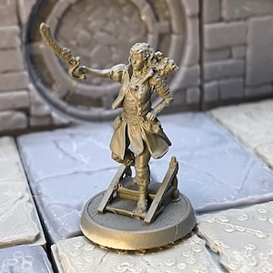 May include: A gray plastic miniature figurine of a female character holding a sword. The character is wearing a long coat and has a backpack on. The figurine is standing on a small platform.