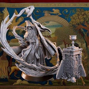 May include: A detailed grey sculpture of a wizard with a long beard and flowing robes, holding a staff. The wizard is surrounded by a decorative frame. Beside it is a chalice on a pedestal, all set against a tapestry background.