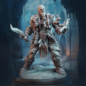 May include: A detailed figurine of a warrior with a long beard, holding two weapons. The figure is clad in fur and armor, with intricate details on the clothing and weapons. The color palette is primarily gray and off-white.