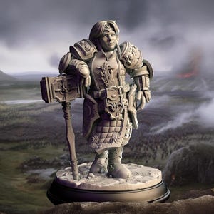 May include: A miniature figurine of a female warrior wearing armor and holding a large hammer. The figurine is painted in a light gray color and is standing on a round base. The background is a blurry image of a battlefield.