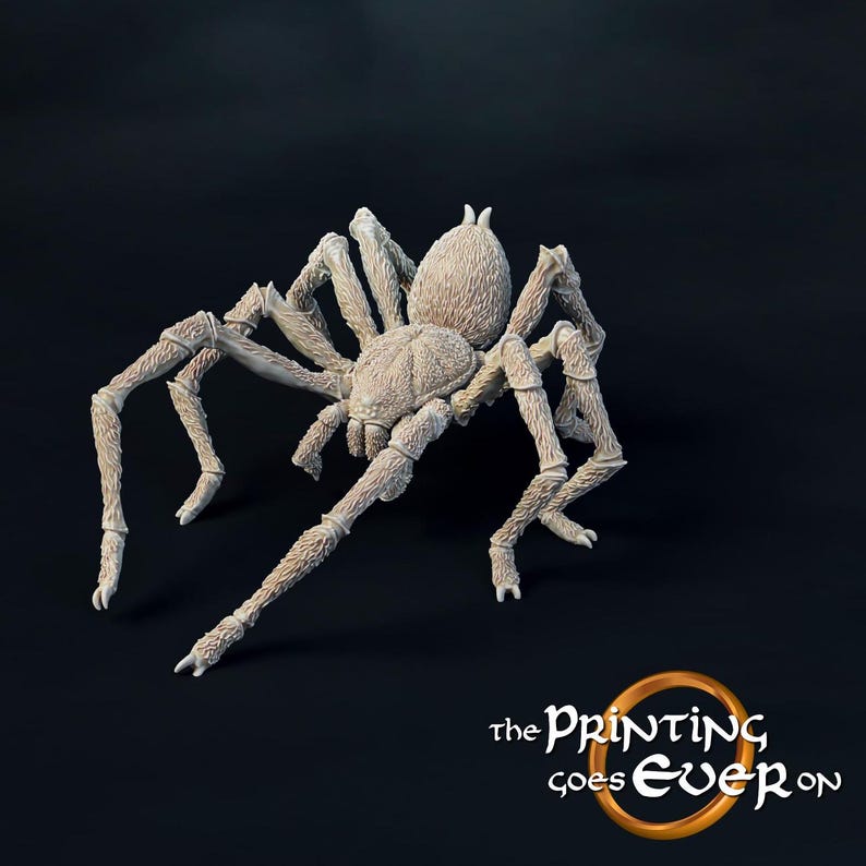 May include: A detailed, white, 3D printed model of a spider with hairy legs and a textured body.