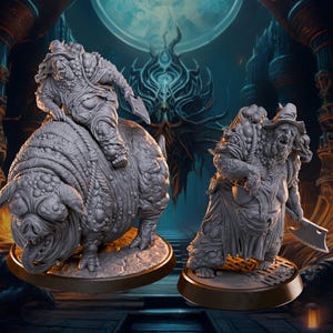 May include: Two detailed gray miniature figures. One figure rides a large, grotesque pig-like creature. The other figure stands holding a cleaver. Both figures are on round bases, set against a dark, fantasy-themed background.