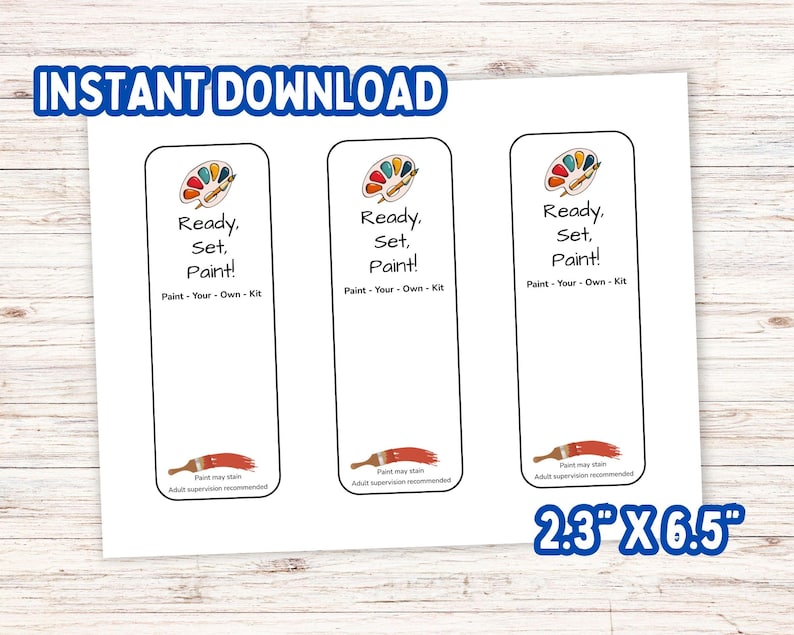May include: Three rectangular bookmarks measuring 2.3 inches by 6.5 inches, each featuring a colorful paint palette, a paintbrush, and the text Ready, Set, Paint! Paint - Your - Own - Kit. The bottom includes the text Paint may stain. Adult supervision recommended.