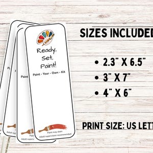 May include: A set of white paper bookmarks with black outlines, featuring a colorful paint palette and brush illustration, the text Ready, Set, Paint! Paint-Your-Own-Kit, and sizes 2.3 inches by 6.5 inches, 3 inches by 7 inches, and 4 inches by 6 inches.