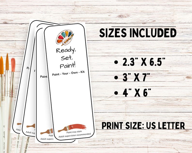 May include: A set of white paper bookmarks with black outlines, featuring a colorful paint palette and brush illustration, the text Ready, Set, Paint! Paint-Your-Own-Kit, and sizes 2.3 inches by 6.5 inches, 3 inches by 7 inches, and 4 inches by 6 inches.