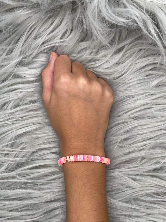 Pink and white homemade clay bracelets