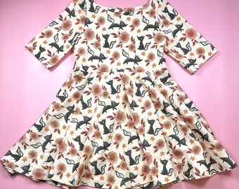 Girls’ Organic Cotton Twirl Dress | Skunk Dress | Boat Neck Dress
