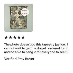 May include: A woven tapestry with a forest scene, featuring trees in shades of green and brown. The tapestry is rectangular and has a wooden rod at the top for hanging. Text on the image reads "WOVEN, not printed!"