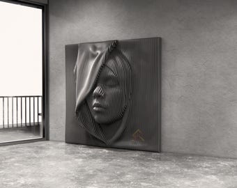 May include: A square wall art piece featuring a three-dimensional relief of a human face partially covered by a hood. The sculpture is composed of numerous vertical dark gray slats that create a layered, ribbed texture forming the facial features.