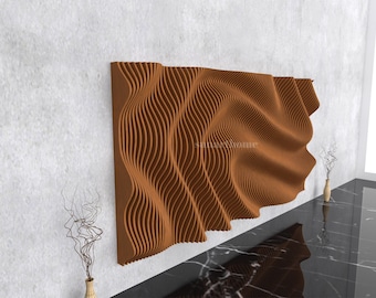May include: A large, brown, wave-patterned wall panel. The panel is made of vertical, curved wooden slats, creating a flowing, three-dimensional effect. The panel is mounted on a white wall, with a black and gray marble floor below.