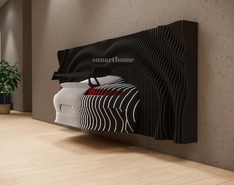 May include: Black and white wall art featuring a stylized car design. The artwork has a layered, wave-like pattern, with red accents. The car is set against a black, textured background, mounted on a wall. The text "sunarthome" is visible.
