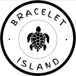May include: A black and white circular logo with the words "BRACELET ISLAND" encircling a sea turtle illustration. The turtle is in the center of the logo, inside a smaller white circle.
