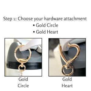 May include: Image showing two gold-coloured hardware attachments: a circle and a heart. The text reads "Step 1: Choose your hardware attachment" with options "Gold Circle" and "Gold Heart".