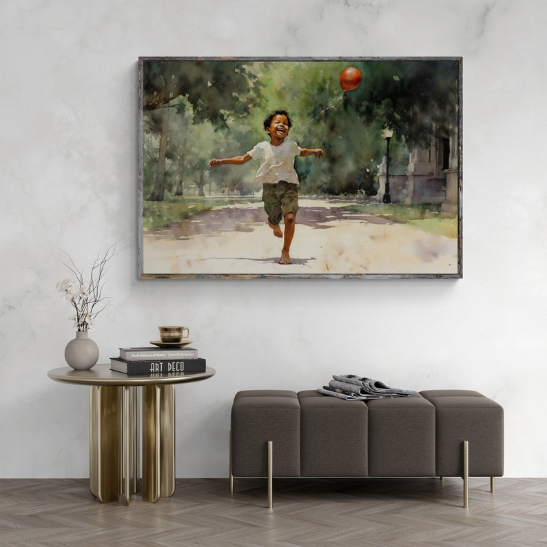 May include: A watercolor painting of a young boy running through a park with a red balloon in the air. The boy is wearing a white shirt and green shorts. The painting is framed in a simple gray frame.
