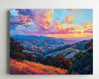 May include: A painting of a mountain landscape with a colorful sunset sky. The mountains are a deep blue and purple, and the sky is a mix of pink, orange, and yellow. There are trees in the foreground, and the sun is setting behind the mountains.