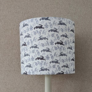 Running hare, a handmade fabric drum lampshade in a grey, white & charcoal country print, available in size 15cm 20cm 25cm 30cm