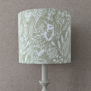 Westleton country animals, a handmade fabric drum lampshade, available in yellow, blue, green, and taupe, in sizes 15cm 20cm 25cm 30cm