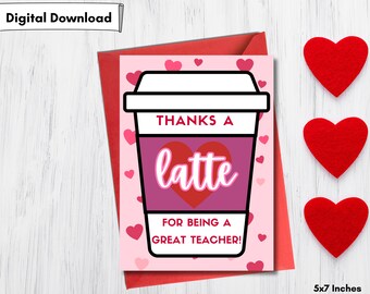 May include: A pink and red Valentine's Day card with a coffee cup illustration and the text "Thanks a latte for being a great teacher!" surrounded by pink hearts. The card is 5x7 inches.