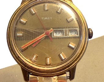 Vintage 1970s Timex Mercury Watch: Gold Tone Day/Date, Hong Kong Band Runs