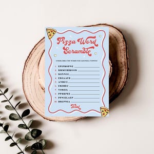 May include: A blue and red printable game card with the title "Pizza Word Scramble". The card has a list of 10 words to unscramble, each representing a pizza topping. The card also features a cartoon pizza with a smiling face.