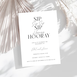 Puede incluir: Una tarjeta de invitación blanca con texto negro anunciando una fiesta de compromiso para Phil y Annie. El texto dice "Sip Sip Sip Hooray HOORAY" e incluye la fecha, la hora y la ubicación del evento. También se incluye información de RSVP.