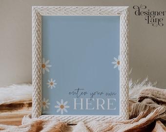 May include: White framed print with a light blue background and white daisies. The text "enter your own HERE" is printed in black on the print.