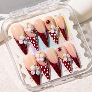 Enchanted Red French Tip Press-On Nails | 3D Red Ladybug & White Floral Design | Long Almond Nails | Dreamy Handmade Nail Art |  Fake Nails