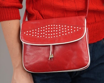 本革の小さめバッグ。両面クロスボディバッグ、ショルダーバッグ