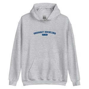 Embroidered Fantasy Varsity Sweater - Snuggly Duckling  - Hoodie (Unisex)