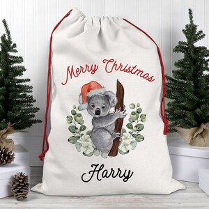 レッドサンタクリスマスバイブスTシャツ、レディースクリスマスシャツ