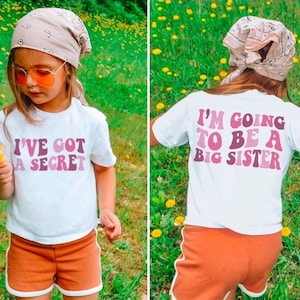 Big Sister geheimes Shirt, ich habe ein geheimes Schwester-Shirt in weiß, Mädchen zur großen Schwester gefördert, Schwangerschaftsmitteilung Kinder-T-Shirt,