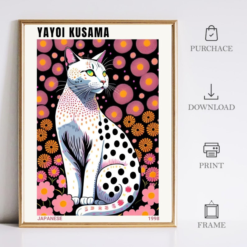 May include: A framed art print featuring a stylized white cat with black spots, green eyes, and a gray striped face. The background is a black field with pink and orange floral patterns. The text "YAYOI KUSAMA" is at the top.