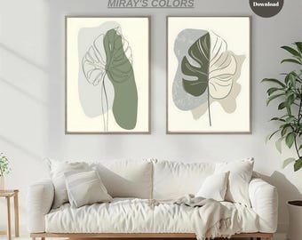 May include: Two framed botanical art prints. Each print features a minimalist line drawing of a monstera leaf in shades of green and beige, set against abstract shapes. The text "MIRAY'S COLORS" is above the prints, and "Digital Download" is in a circle.
