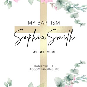 May include: A white card with a gold cross and floral accents. The text "My Baptism" is at the top, followed by "Sophia Smith" and "01.01.2023". The bottom of the card reads "Thank you for accompanying me".