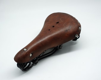 Original Schweizer Fahrradsitzsattel Armee-Fahrradsitz Militär surpus M93 M-93 Fahrad Ordonnanz 08 Condor Leder Original PAG 1953