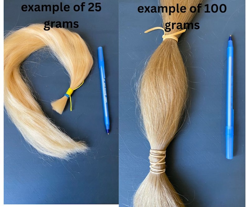 May include: Two bundles of blonde hair, one labeled "example of 25 grams" and the other "example of 100 grams." Each bundle is secured with rubber bands. A blue pen is next to each bundle for size comparison. The background is a solid dark blue.