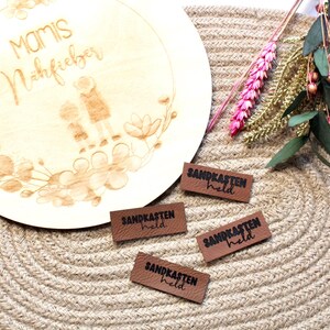 Leather label "Sandpit Hero" 2 x 5 cm