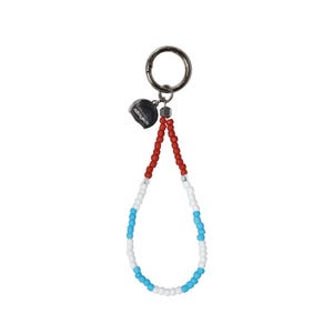 May include: A keychain with a silver ring and a beaded loop. The loop features red, white, and blue beads, with a small black charm that reads "Allóglitch". The keychain is designed for attaching to keys or bags.