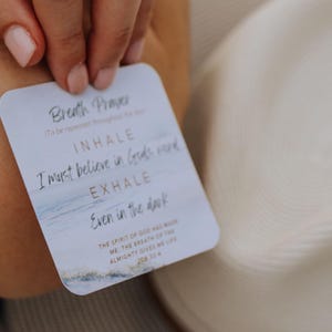 May include: A square card with rounded corners featuring the text Breath Prayer, Inhale I must believe in Gods word, Exhale Even in the dark, and The spirit of God has made me: the breath of the Almighty gives me life Job 33:4, with a blue watercolor design.