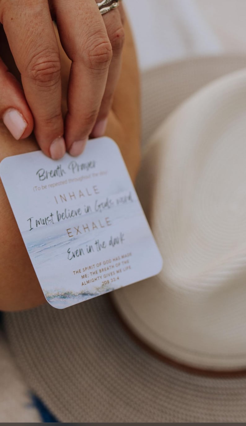 May include: A square card with rounded corners featuring the text Breath Prayer, Inhale I must believe in Gods word, Exhale Even in the dark, and The spirit of God has made me: the breath of the Almighty gives me life Job 33:4, with a blue watercolor design.