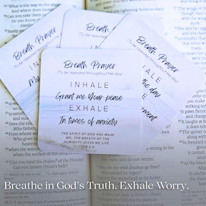 May include: A set of square white cards with rounded corners featuring the text Breath Prayer, Inhale, Grant me Your peace, Exhale, In times of anxiety, and the Bible verse Job 33:4, set against a soft blue ocean horizon background.