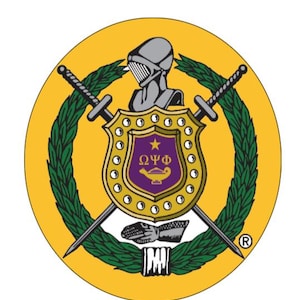 May include: A circular emblem with a gold background features a shield with a purple interior and gold trim. The shield is flanked by crossed swords and surrounded by a green wreath. A knight's helmet sits above the shield. The emblem includes the letters "&Omega;&Psi;&Phi;".