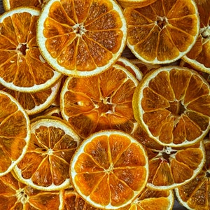 Dried orange slices food. Dried fruits. Orange dehydrated food. Holiday DIY mixology cocktail garnish mulling spice image 3