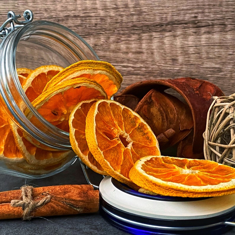 Dried orange slices food. Dried fruits. Orange dehydrated food. Holiday DIY mixology cocktail garnish mulling spice image 1