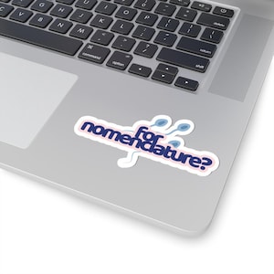 May include: A die-cut sticker featuring the dark blue text "nomenclature?" with the word "for" in a smaller font above it. The design includes light blue, sperm-like cell illustrations integrated into the lettering on a white background.