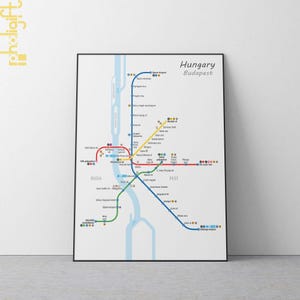 May include: A subway map of Budapest, Hungary, showing the four lines of the metro system. The map is color-coded with red, blue, yellow, and green lines. The map also includes the names of the stations and the river Danube.