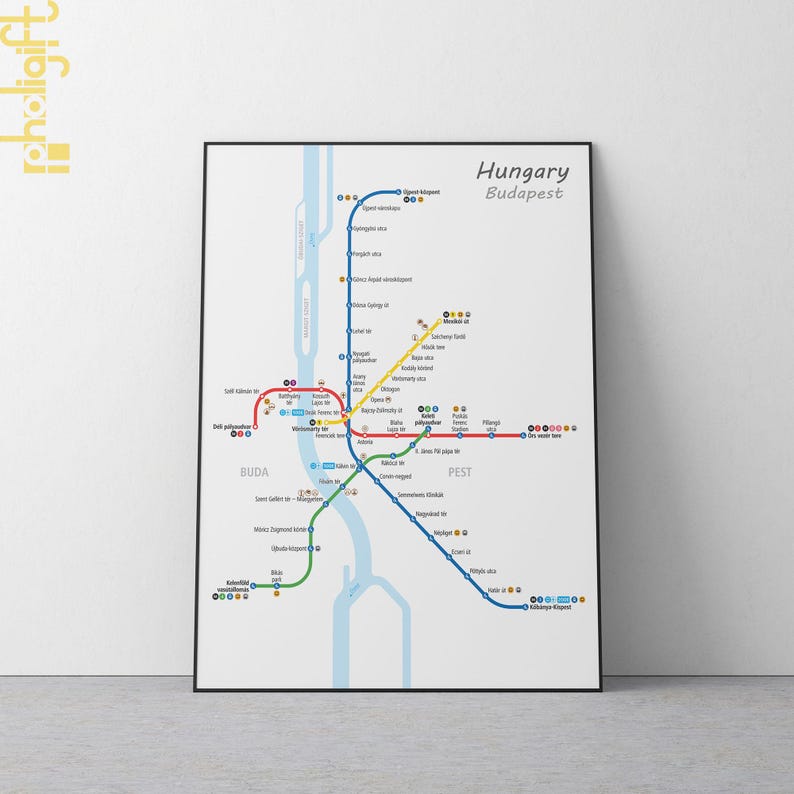 May include: A subway map of Budapest, Hungary, showing the four lines of the metro system. The map is color-coded with red, blue, yellow, and green lines. The map also includes the names of the stations and the river Danube.